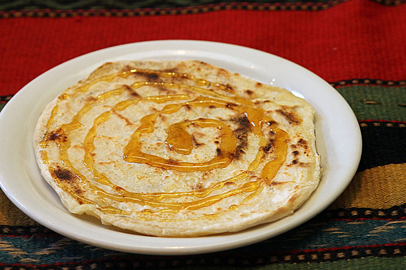 Sfakian pie with Cretan cheese and honey