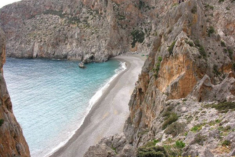 The crystal secluded beach at the end of Agiofarago Gorge